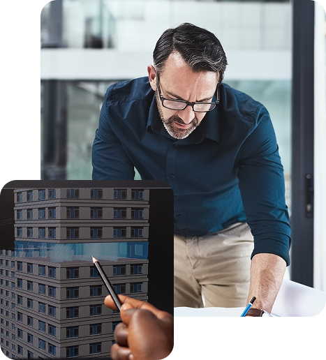 Two interior designers examining architectural layout plans on a tablet in an office setting