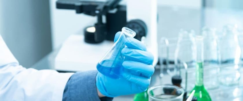 People working in lab space optimized by occupancy intelligence.