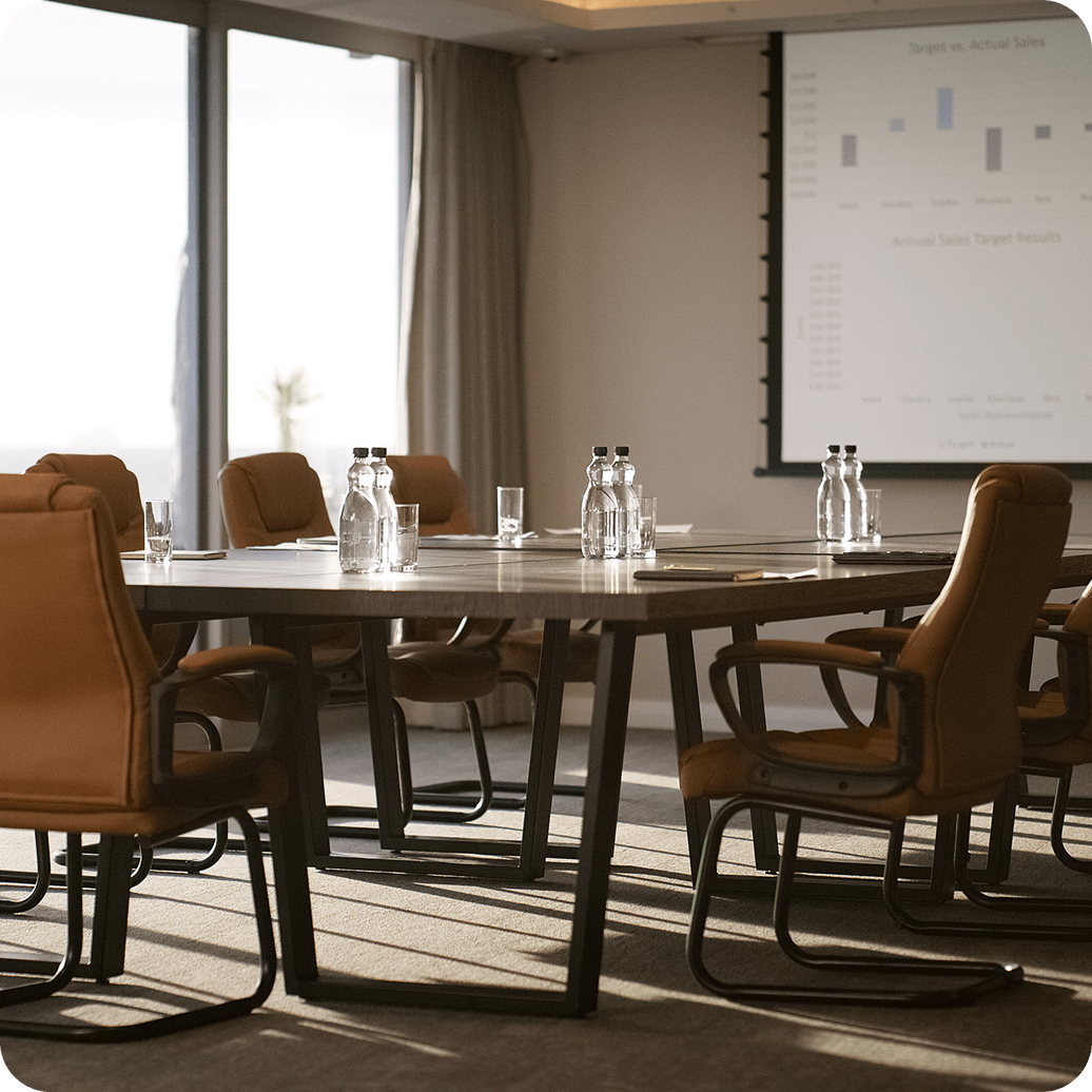 Modern corporate office space showing meeting rooms and open seating areas