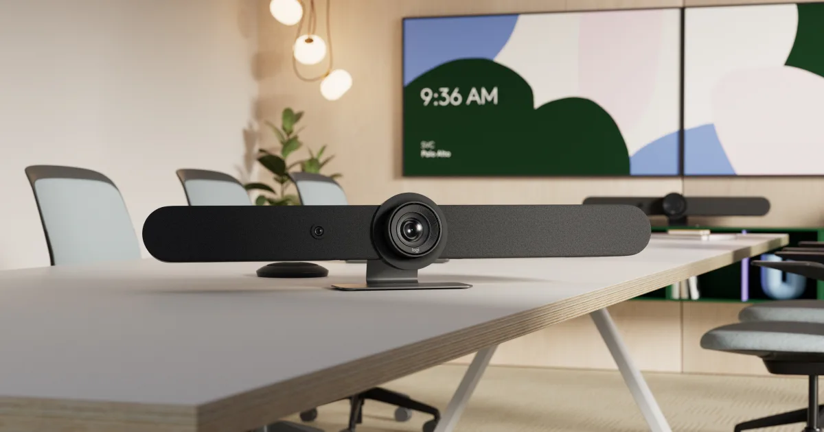 Logitech Rally Bar video hardware mounted in a conference room.